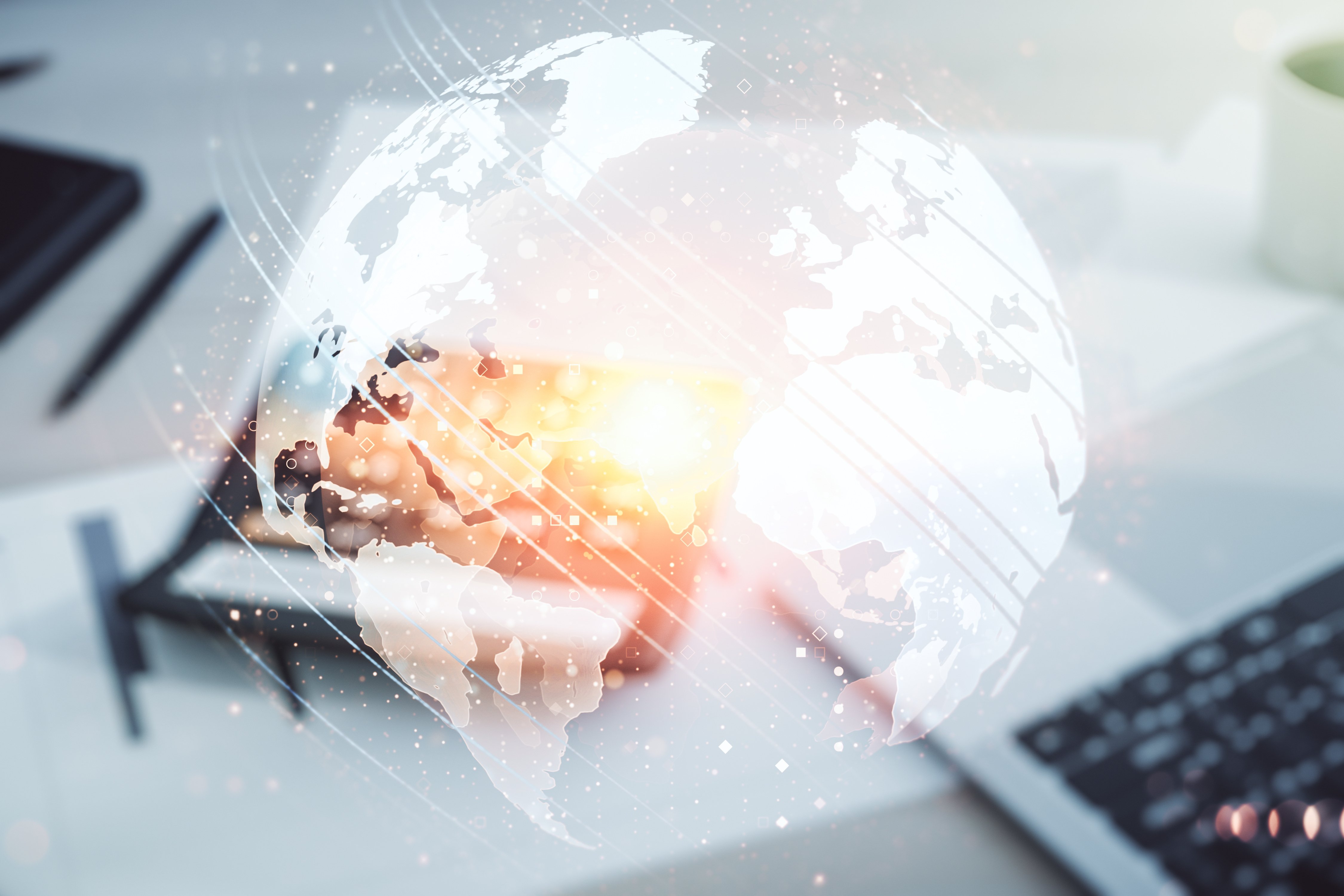 Abstract creative world map interface on calculator and laptop background, international trading concept. Multiexposure